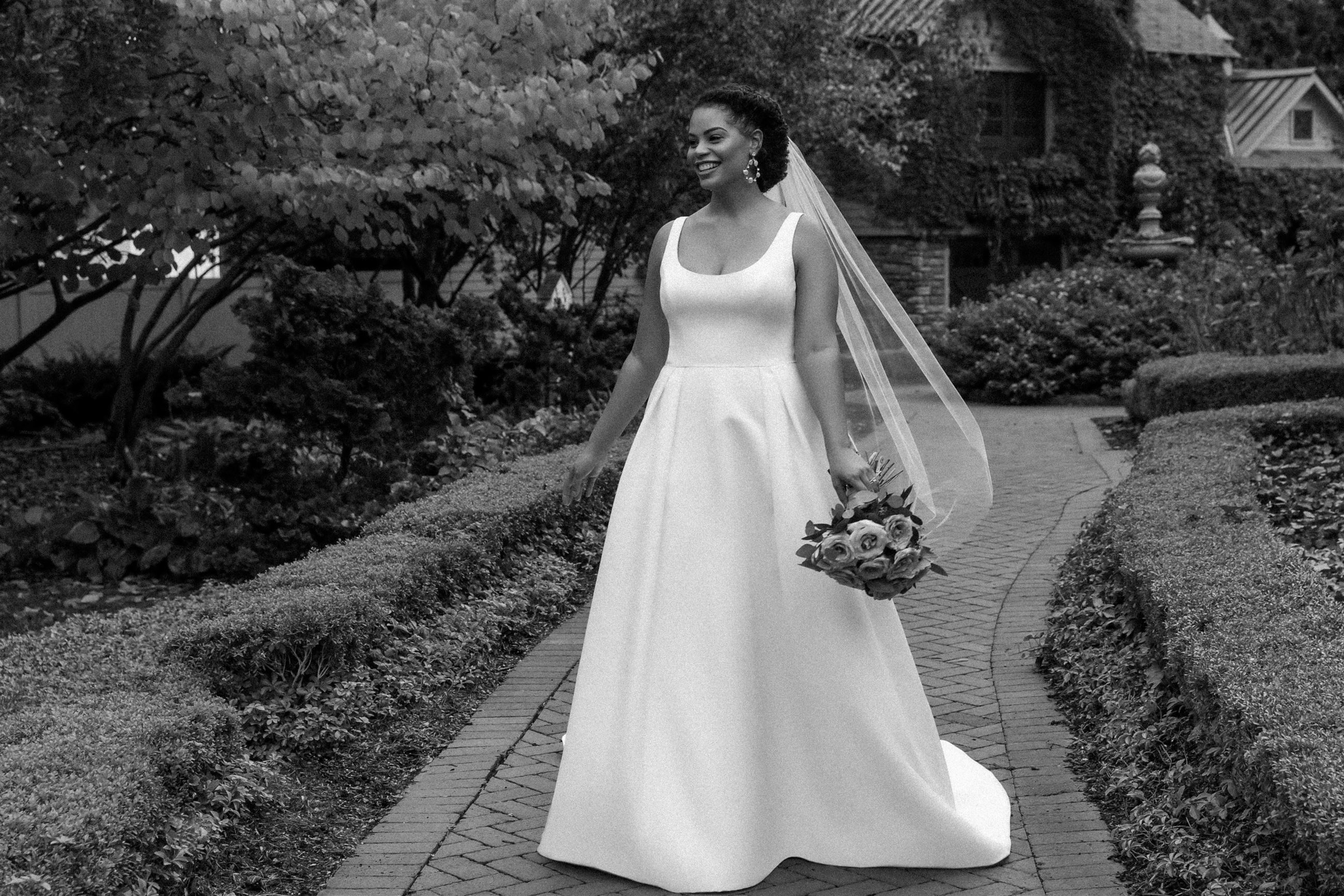 Bride wearing plus size wedding dress by Sareh Nouri
